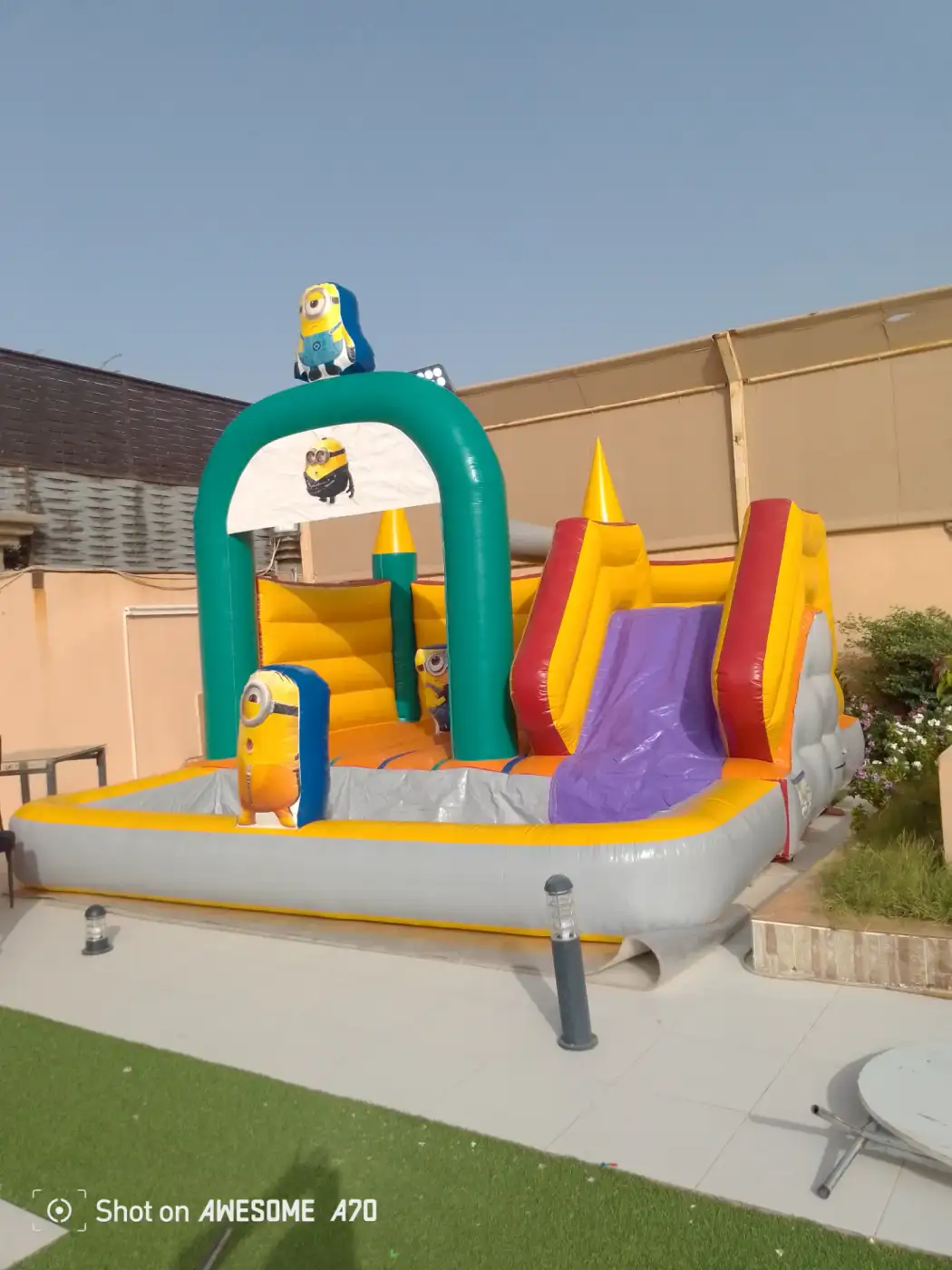 Slide with bouncer and children's pool