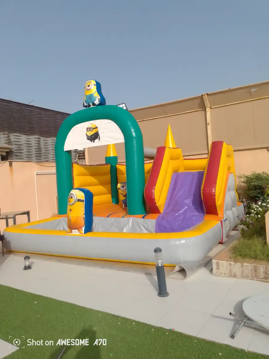 Slide with bouncer and children's pool